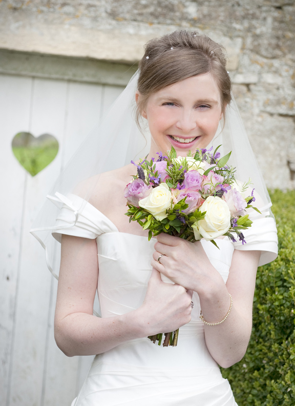Bride-heart-detail-door-Guyers-House-Hotel-wedding-photographer-summer-wedding