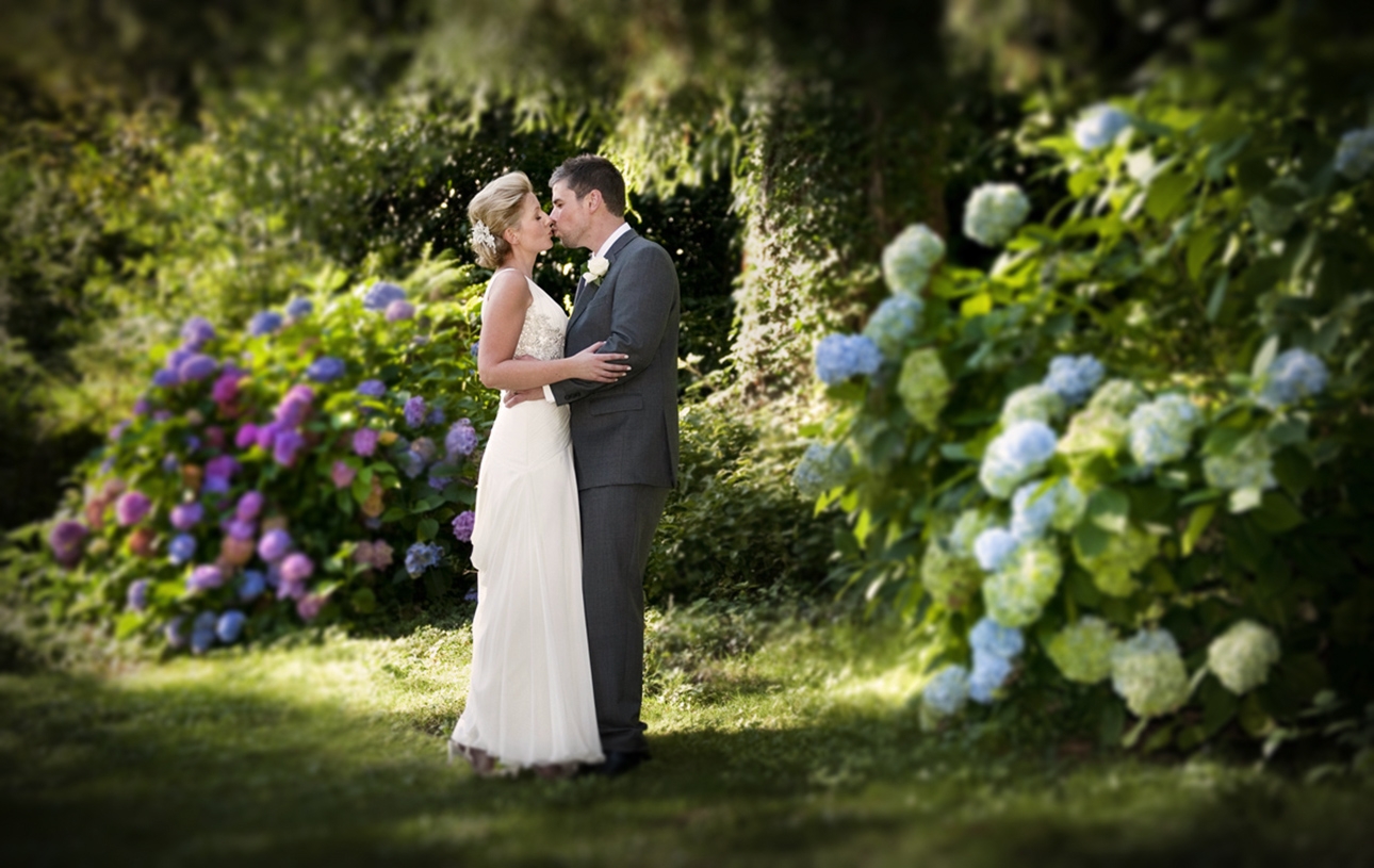 new-house-hotel-wedding-photographer-bride-groom-kissing-romantic-wedding-photographers-south-wales.jpg