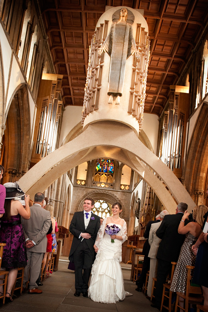Llandaff-Cathedral-wedding-photographer-Bride-and-Groom-walking-down-aisle-cardiff-wedding-photographers