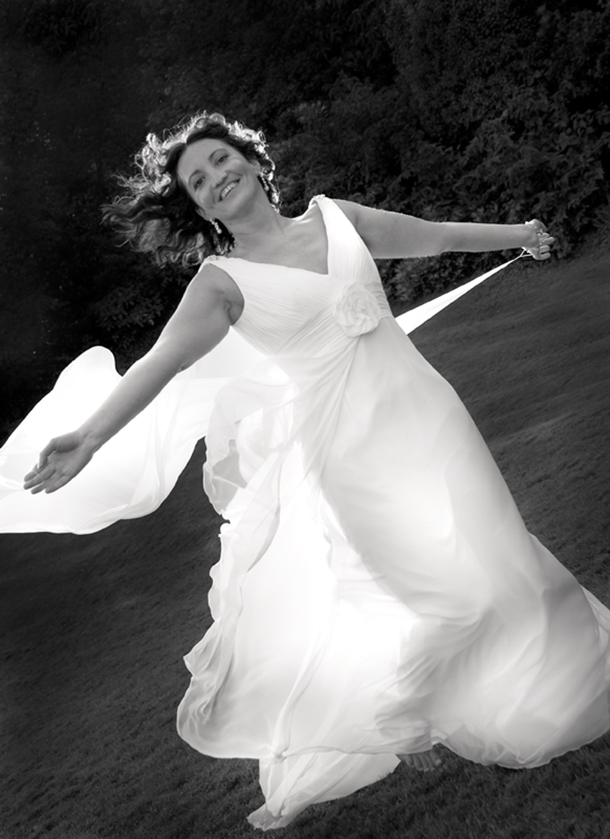 Bride-running-the-rectory-galndore-black-and-white-wedding-photography