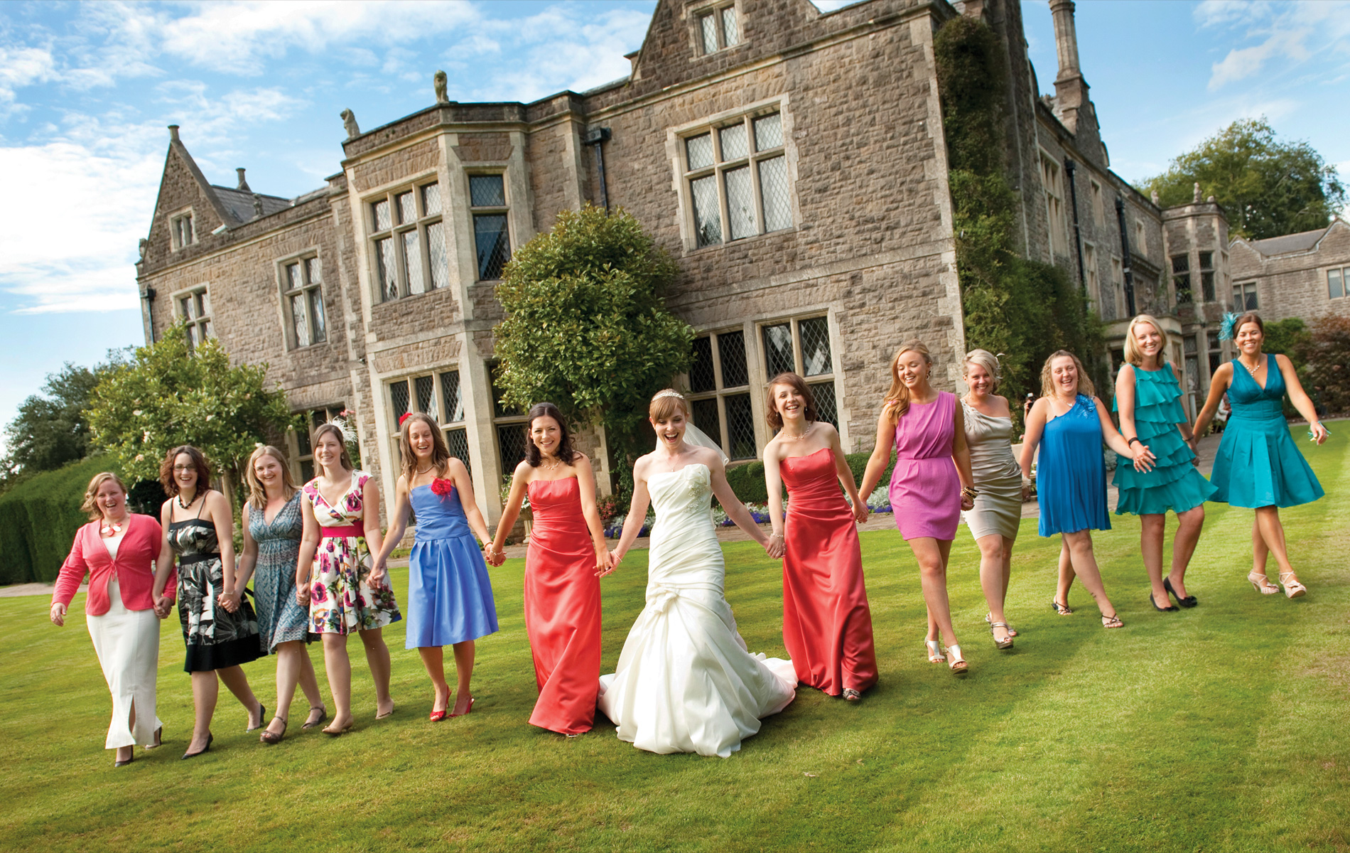 Miskin-Manor-Hotel-summer-wedding-bride-colourful-guests-south-wales-wedding-photographers